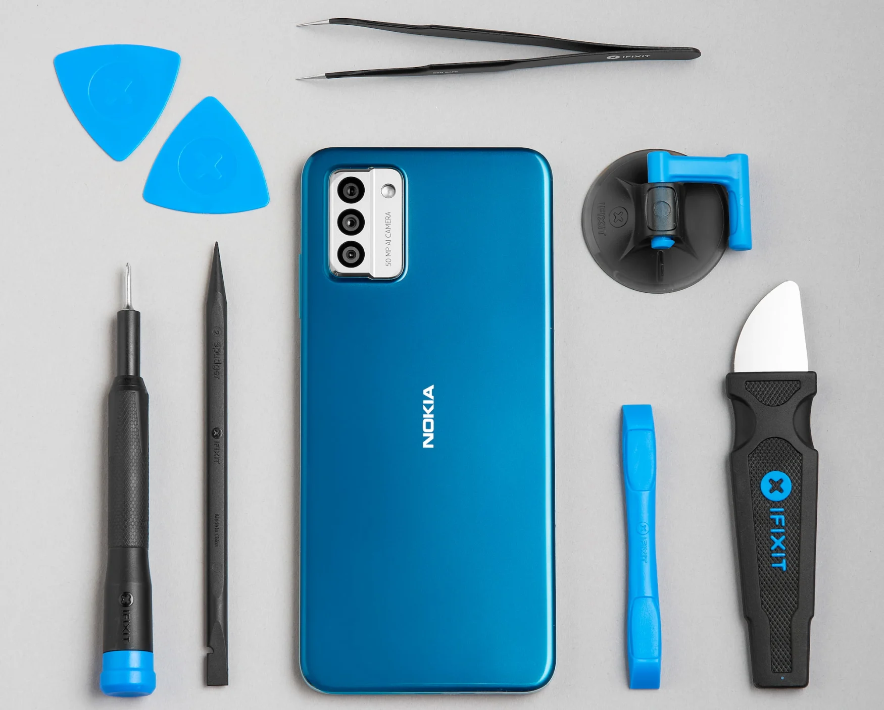 Nokia G22 and a variety of repair tools