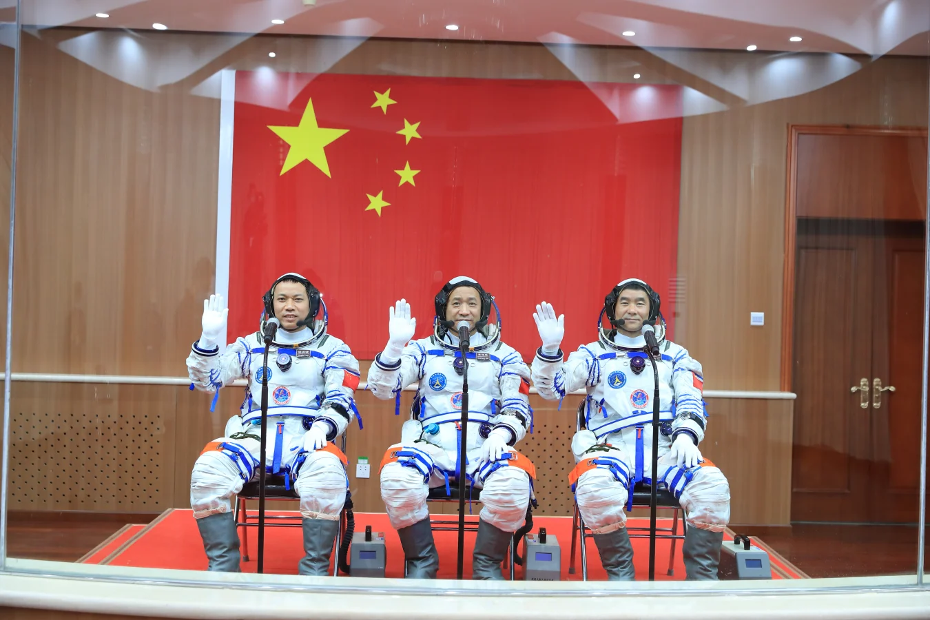 JIUQUAN, CHINA - JUNE 17: (L-R) Astronauts Tang Hongbo, Nie Haisheng and Liu Boming attend a see-off ceremony for Chinese astronauts of the Shenzhou-12 manned space mission at Jiuquan Satellite Launch Center on June 17, 2021 in Jiuquan, Gansu Province of China. China launches the Shenzhou-12 spacecraft, carried on the Long March-2F rocket, to Chinese Tiangong space station. (Photo by Yang Zhiyuan/VCG via Getty Images)
