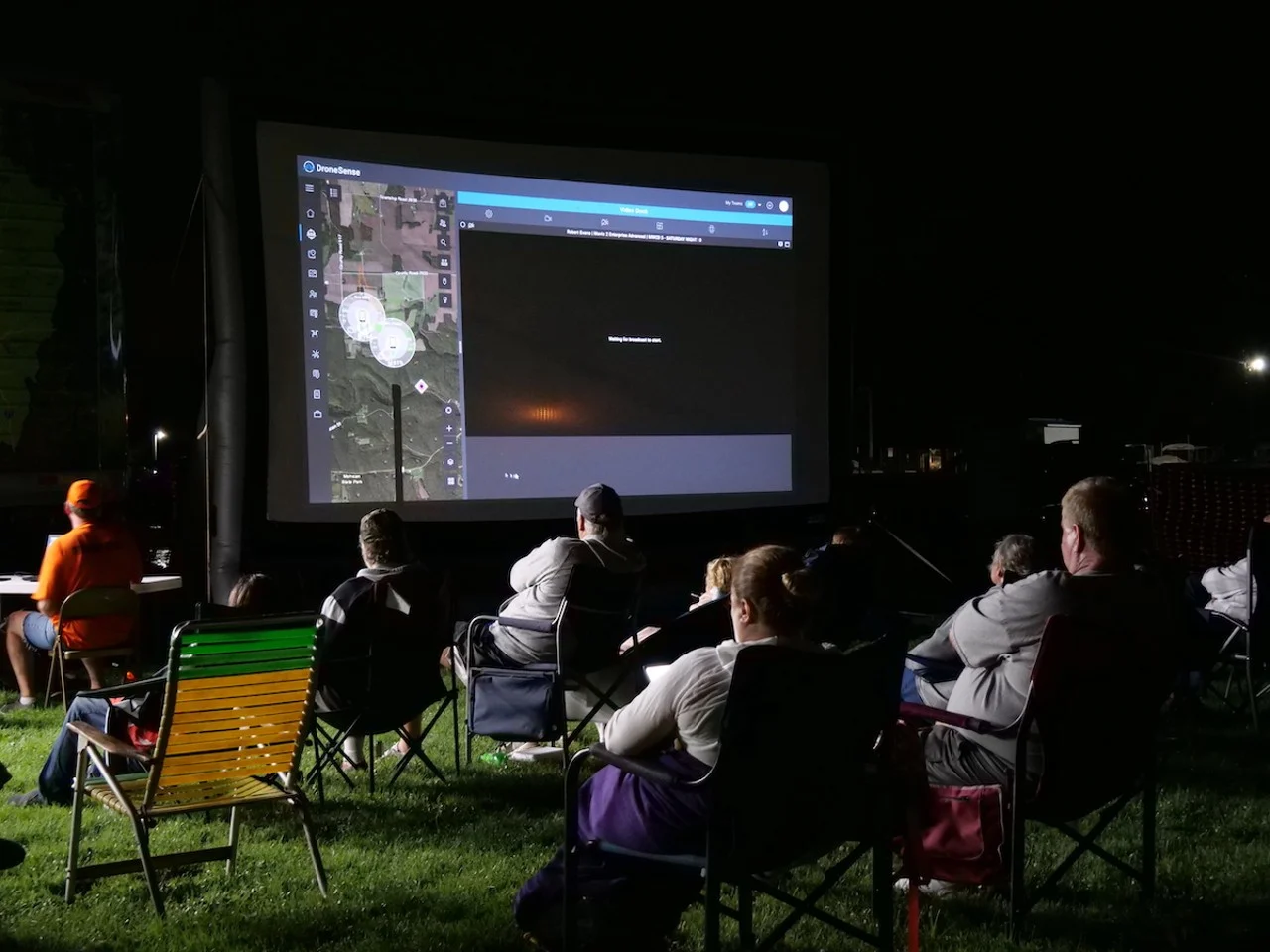 A crowd watches Matt Moneymaker demonstrate drone technology during Bigfoot Basecamp in September 2022
