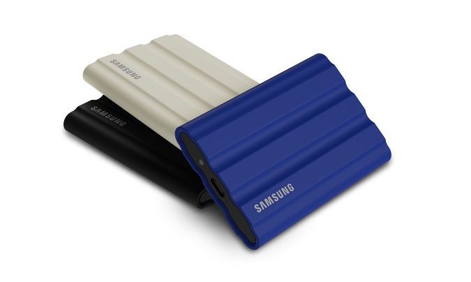 Samsung T7 Shield portable SSD in blue, black and beige.