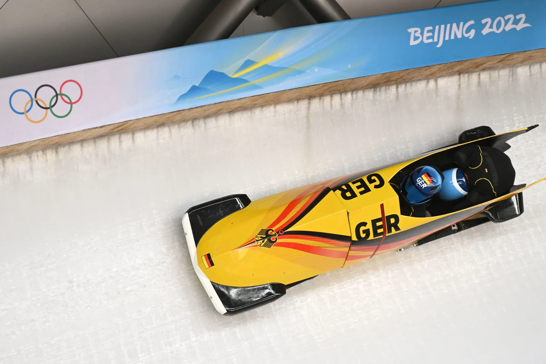 Germany's bobsleigh team members practice at the Yanqing National Sliding Centre in Yanqing district on February 2, 2022, ahead of the Beijing 2022 Winter Olympic Games. (Photo by Daniel MIHAILESCU / AFP) (Photo by DANIEL MIHAILESCU/AFP via Getty Images)