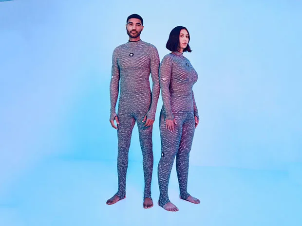 Picture of two people with different body shapes wearing the Zozofit Zozosuit, used for making quick 3D scans of your body.