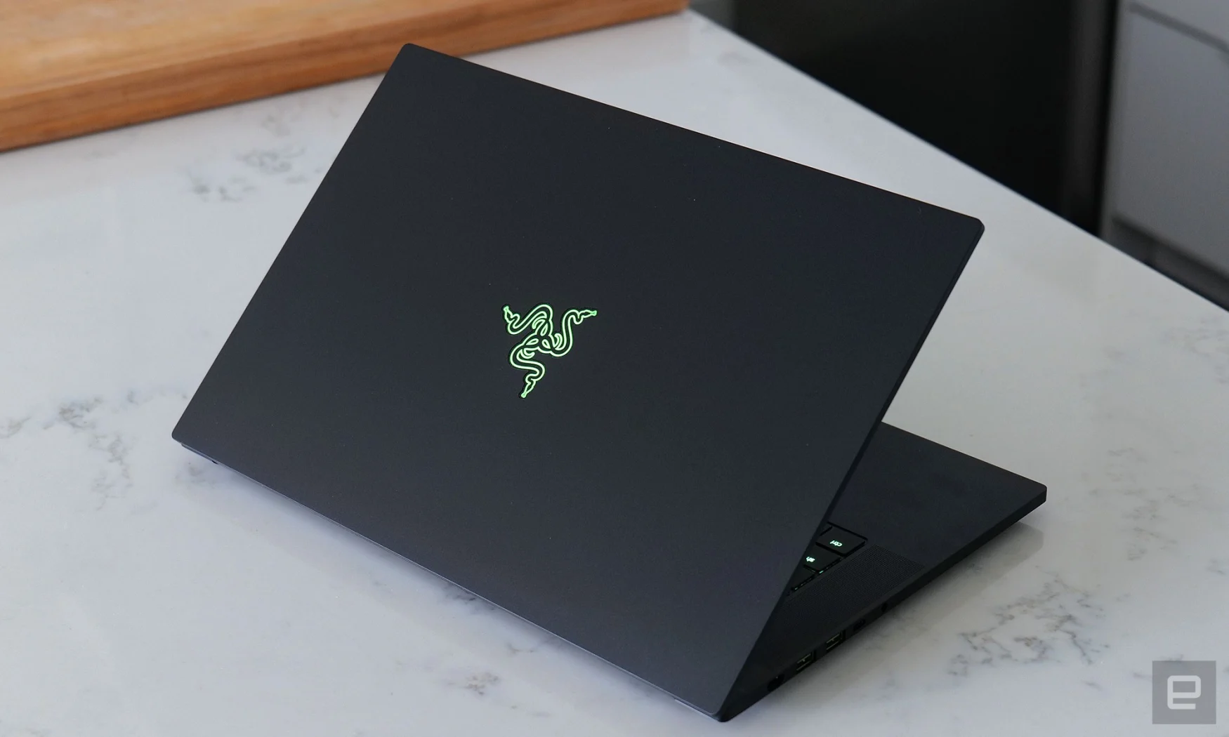 The Razer logo on the Blade 15's lid lights up, but you only get one color option: neon green. 