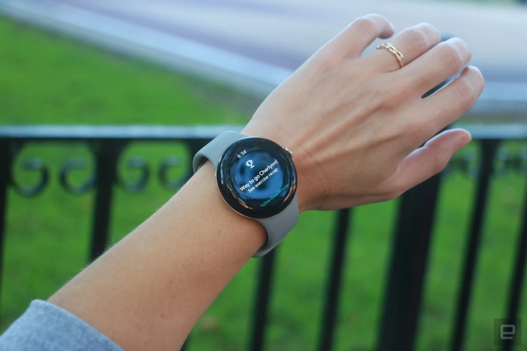 The Pixel Watch 2 on a person's wrist, showing the words 