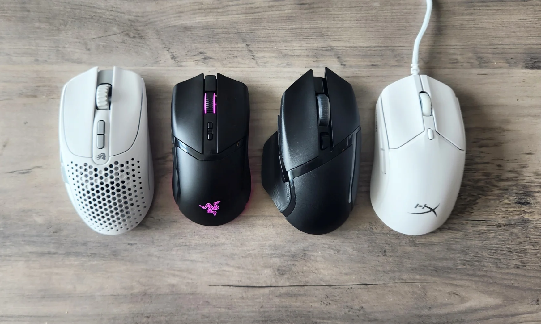 A few of the gaming mice we tested for our latest update. Left to right: the Glorious Model I 2 Wireless, the Razer Cobra Pro, the Razer Basilisk V3 X HyperSpeed and the HyperX Pulsefire Haste 2.