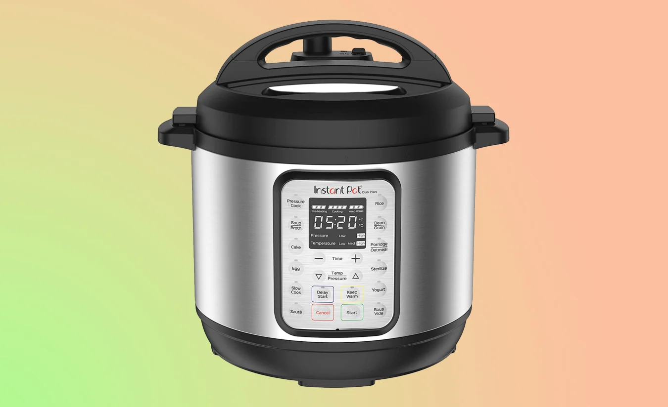 An Instant Pot Duo Plus multicooker on a green and orange background.