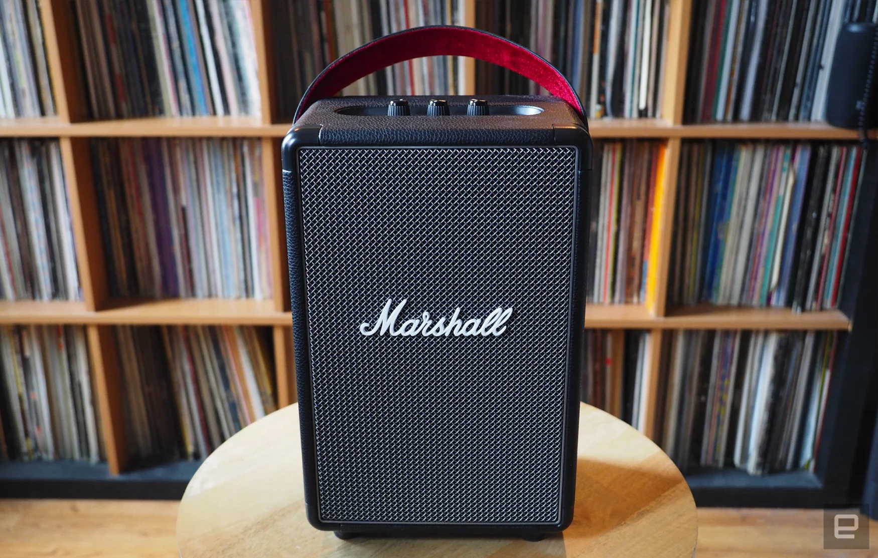 The Marshall Tufton photographed for Engadget's 2022 portable Bluetooth speaker guide in front of a shelf full of records.