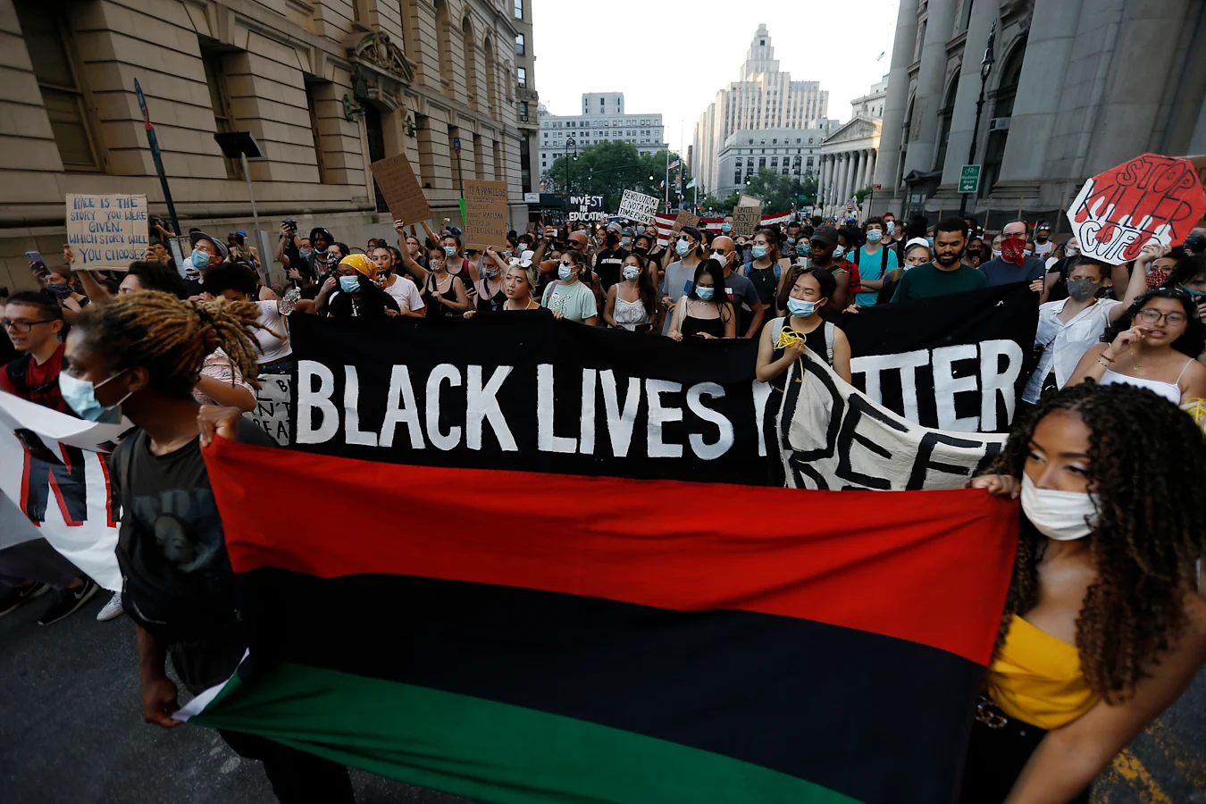 Demonstrators march around City Hall demanding that the city defund the NYPD, in New York City US on June 23, 2020. Mayor Bill de Blasio pledged to divert part of the NYPD's 6 billion dollar budget to social services. The proposed action is slated to be finalized by July 1, 2020. (Photo by John Lamparski/NurPhoto via Getty Images)