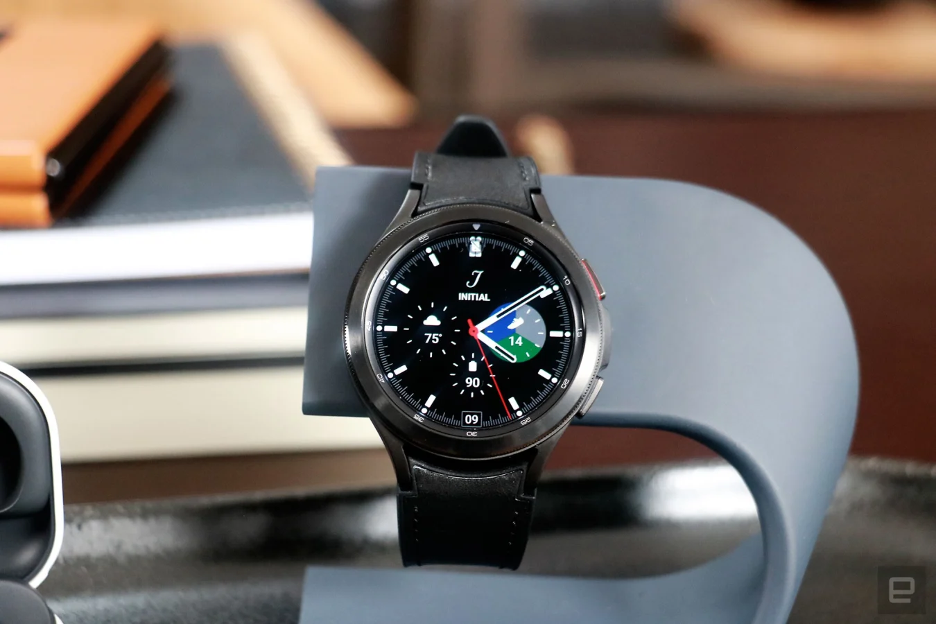 A black Galaxy Watch 4 Classic with a rotating bezel.