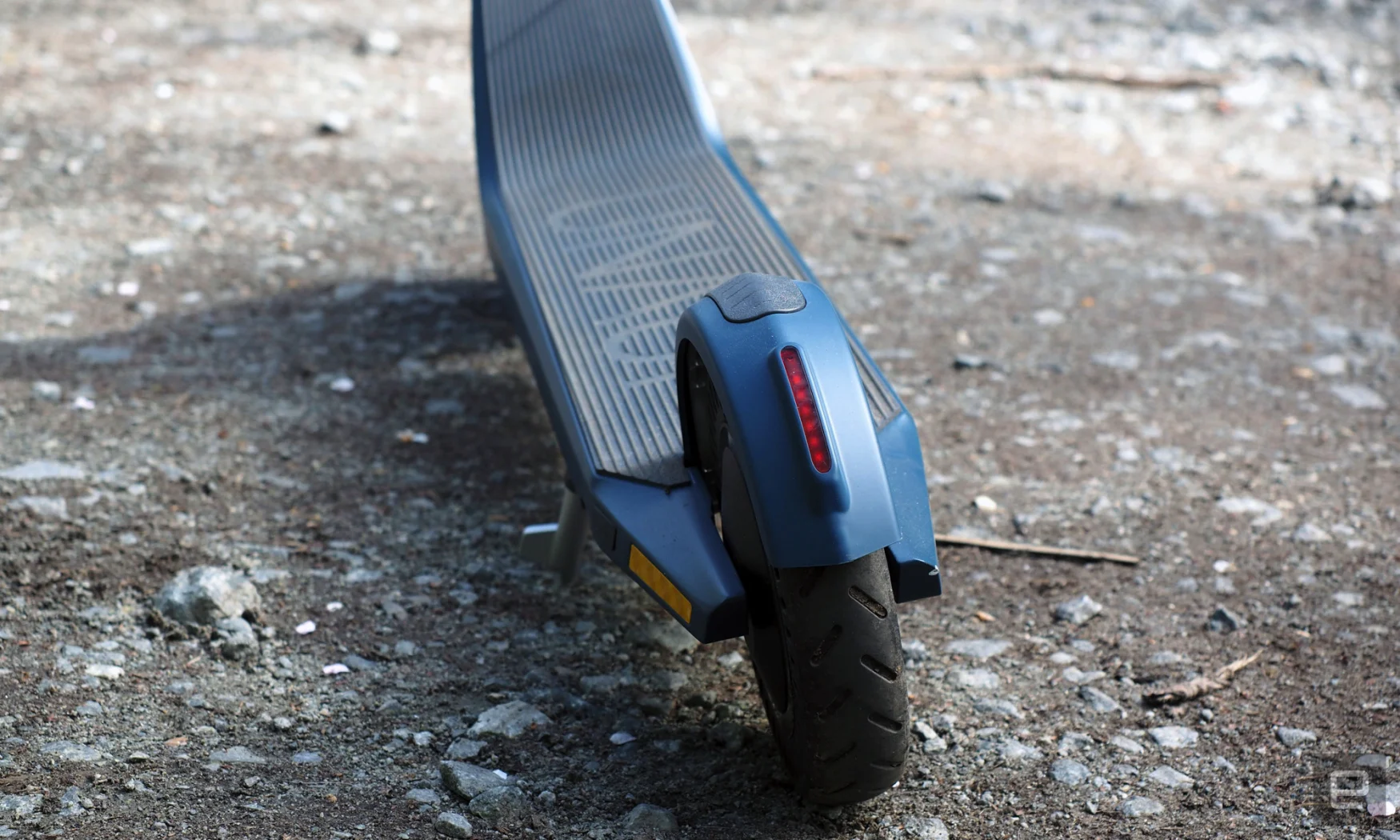 Image of the rear wheel and tail light for the Unagi Model One Voyager