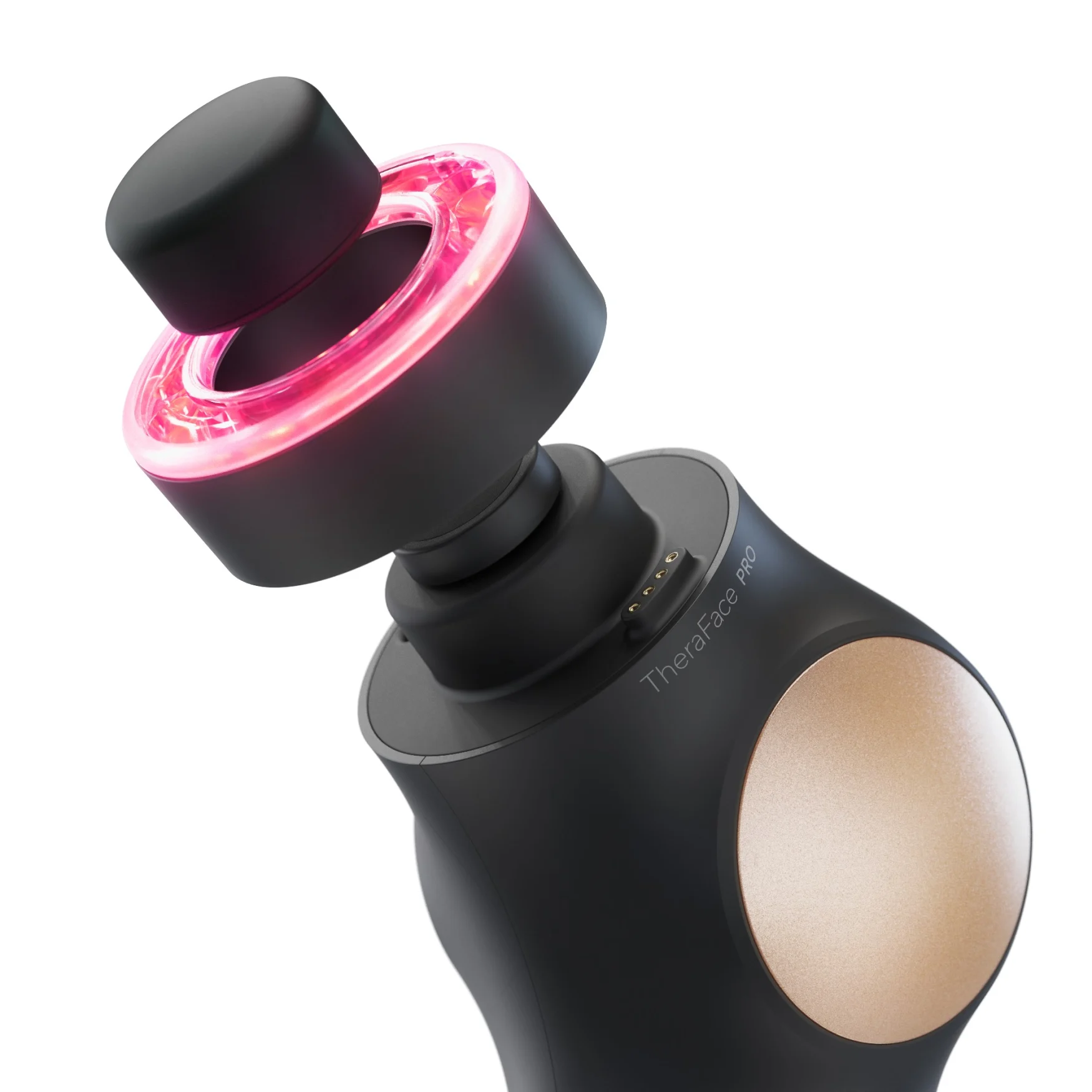 A close-up of the TheraFace Pro with the ring light attachment hovering over its motor.