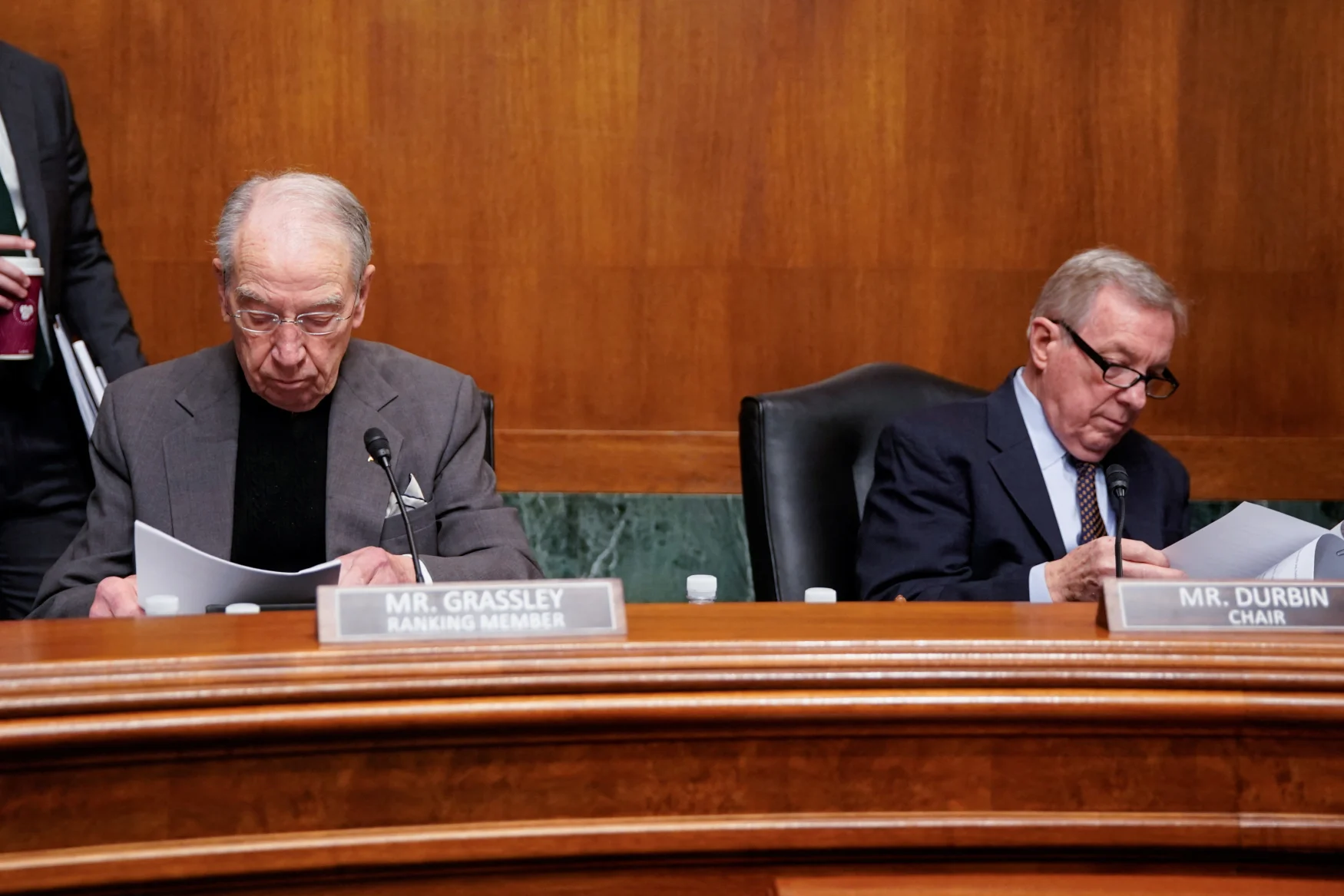 Ranking member U.S. Senator Chuck Grassley (R-IA) and Chair U.S. Senator Dick Durbin (D-IL) take their seats before the start of a U.S. Senate Judiciary Committee hearing on Capitol Hill in Washington, U.S., February 16, 2022. REUTERS/Elizabeth Frantz