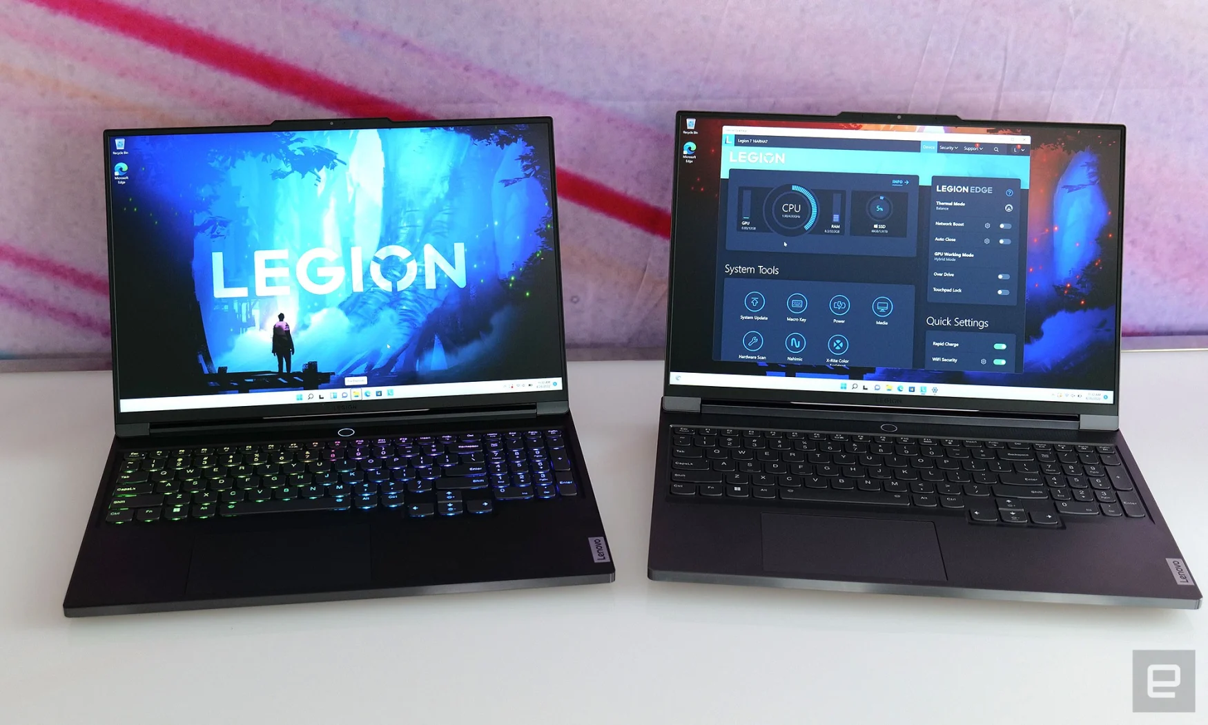 The standard Legion 7 (right) is thicker and heavier than the Legion 7 Slim (left), but it supports more powerful components and has a plethora of RGB lighting.