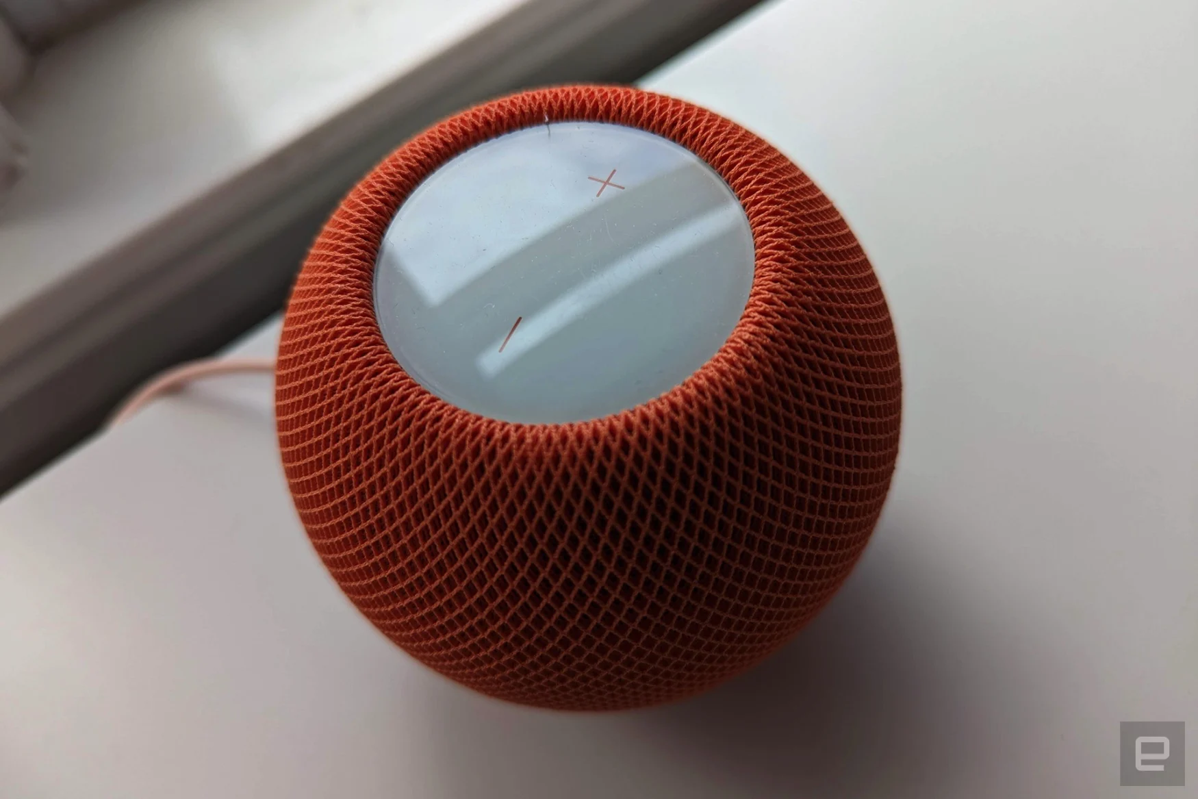 Apple HomePod mini in orange