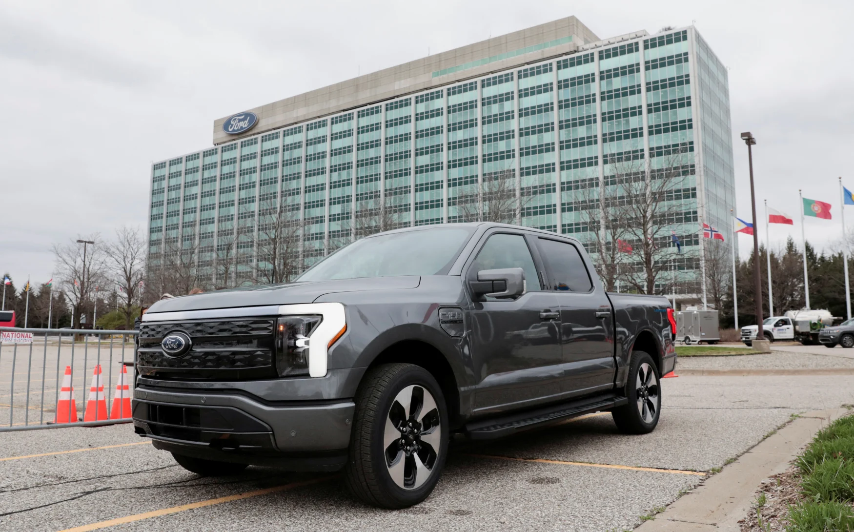 A model of the all-new Ford F-150 Lightning electric pickup is parked in front of the Ford Motor Company World Headquarters in Dearborn, Michigan, U.S. April 26, 2022. REUTERS/Rebecca Cook