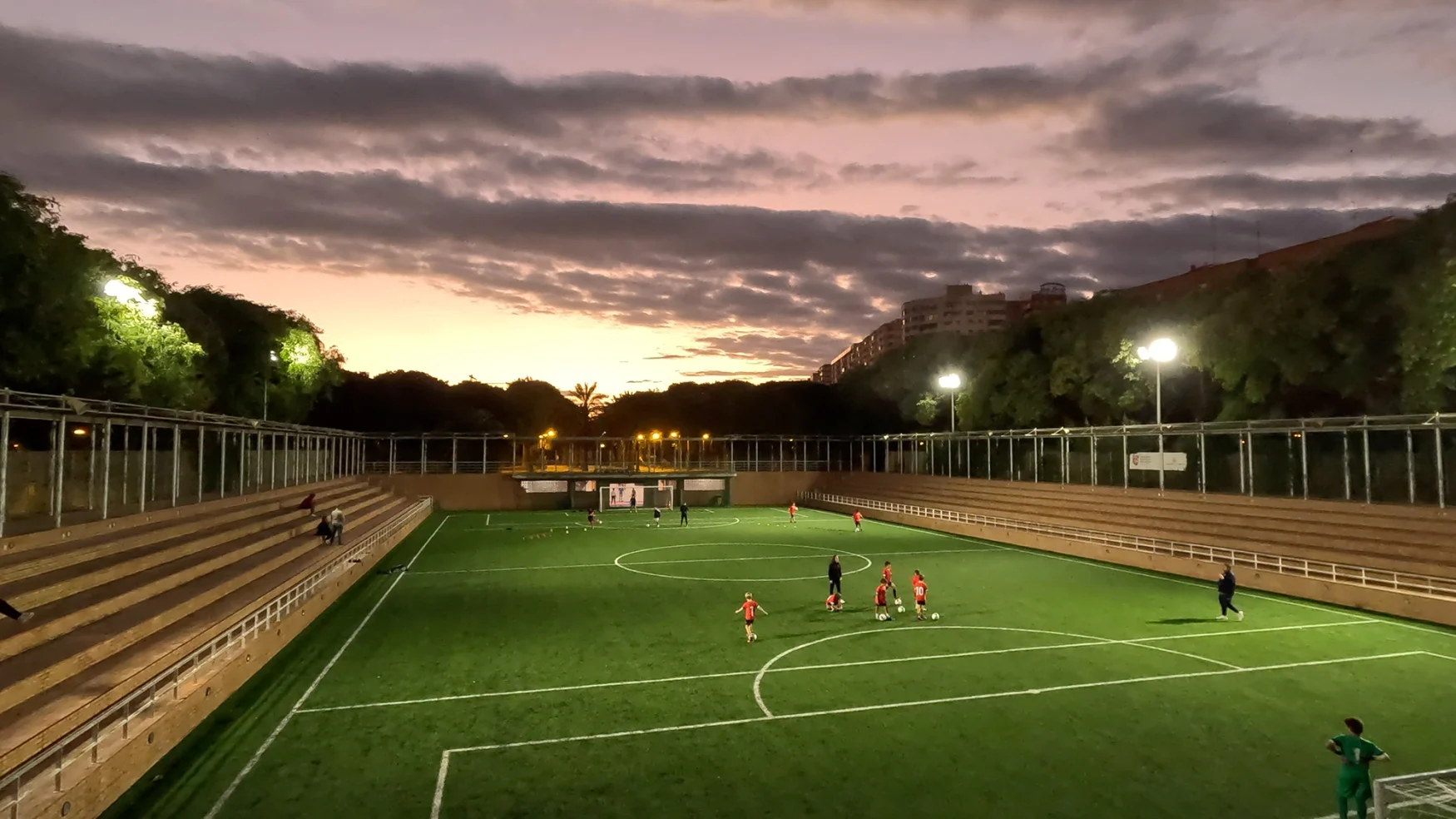 A picture of a football pitch at dusk which was take from a video of the same shot by the GoPro Hero 11 Black Mini.