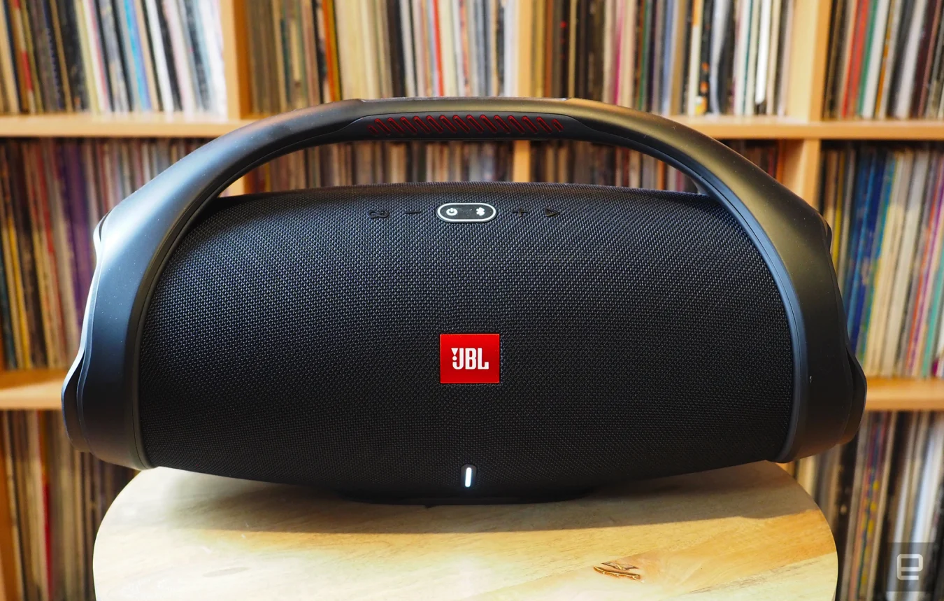 The JBL Boombox 2 photographed for Engadget's 2022 portable Bluetooth speaker guide in front of a shelf full of records.