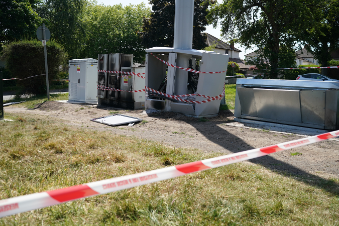 LIVERPOOL, ENGLAND - MAY 28: Fire and explosion damage can be seen on an EE network 5G mast that was attacked by an arsonist earlier this week in Brodie Avenue on May 28, 2020 in Liverpool, England. A lot of the damage was caused by the resulting explosion when the petrol was ignited. Several phone masts have been deliberately damaged around the UK, their attackers inspired by a conspiracy theory positing that 5G technology is linked to the spread of the coronavirus. (Photo by Christopher Furlong/Getty Images)