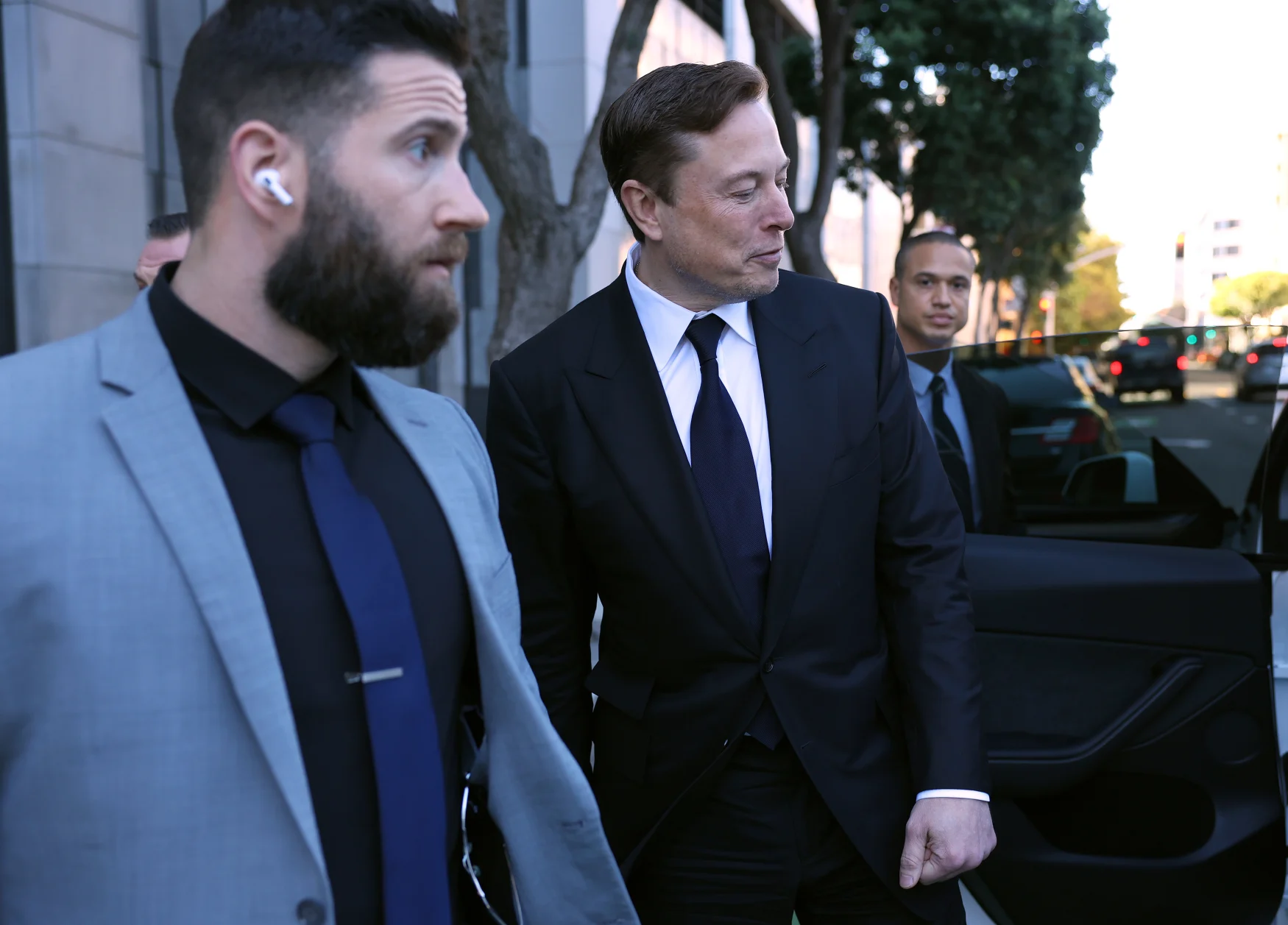 SAN FRANCISCO, CALIFORNIA - JANUARY 24: Tesla CEO Elon Musk leaves the Phillip Burton Federal Building on January 24, 2023 in San Francisco, California.  Musk testified in court in a lawsuit filed by investors against Tesla and Musk over tweets he wrote in August 2018, saying he took Tesla private with the funding he provided.  The tweet turned out to be false and Tesla's stock price began to fluctuate wildly based on the tweet, costing shareholders billions of dollars.  (Photo by Justin Sullivan/Getty Images)