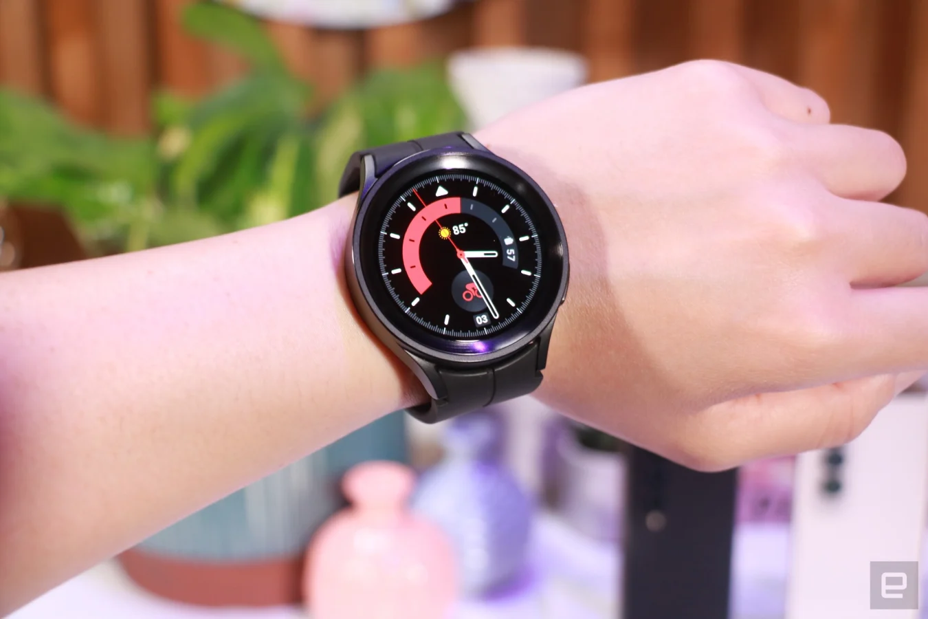 A black Galaxy Watch 5 Pro on a woman's wrist.