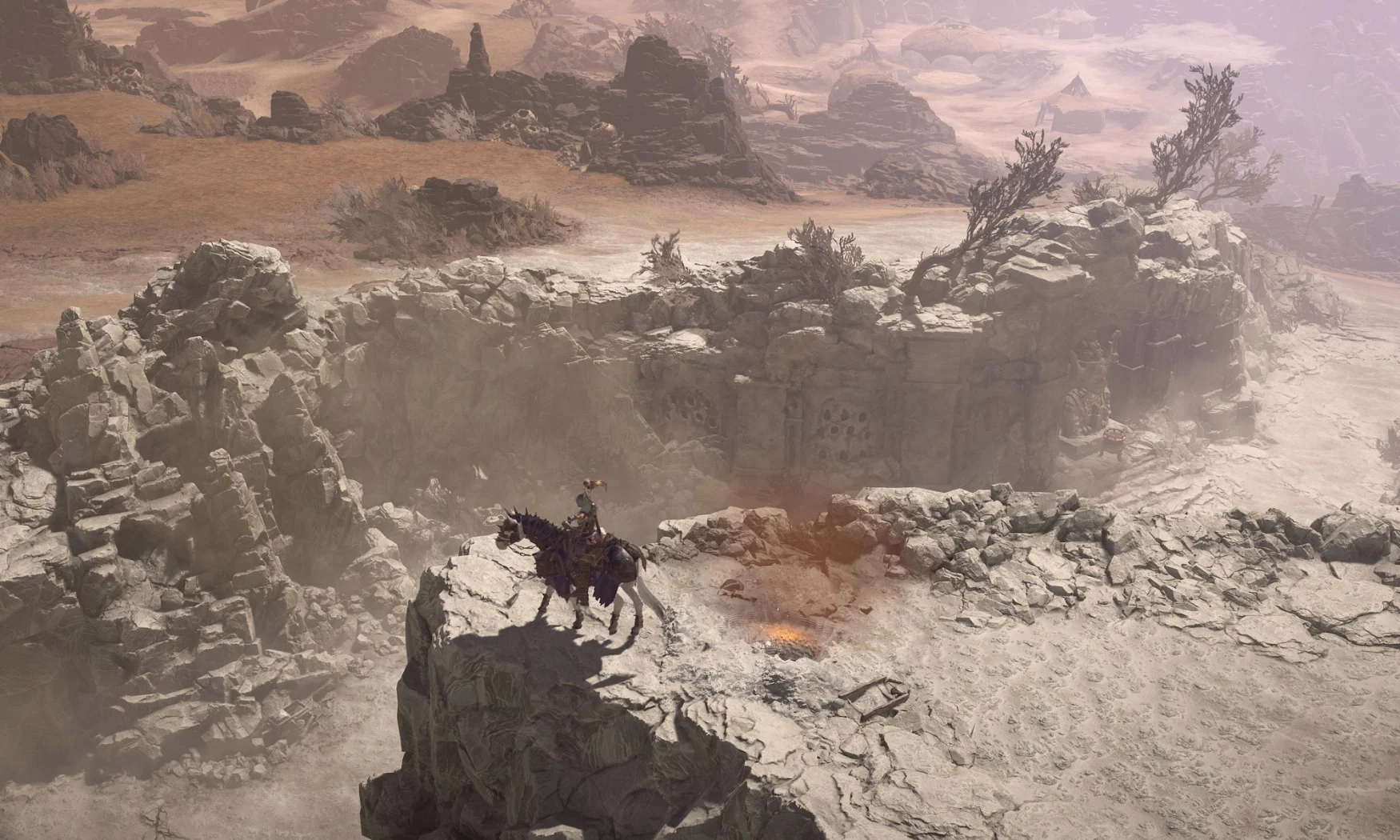 Screenshot van de Dry Steppes, een van de gebieden die spelers kunnen bezoeken in Diablo IV.  De Xirosteppe-omgeving wordt gekenmerkt door woestijn en droog struikgewas. 