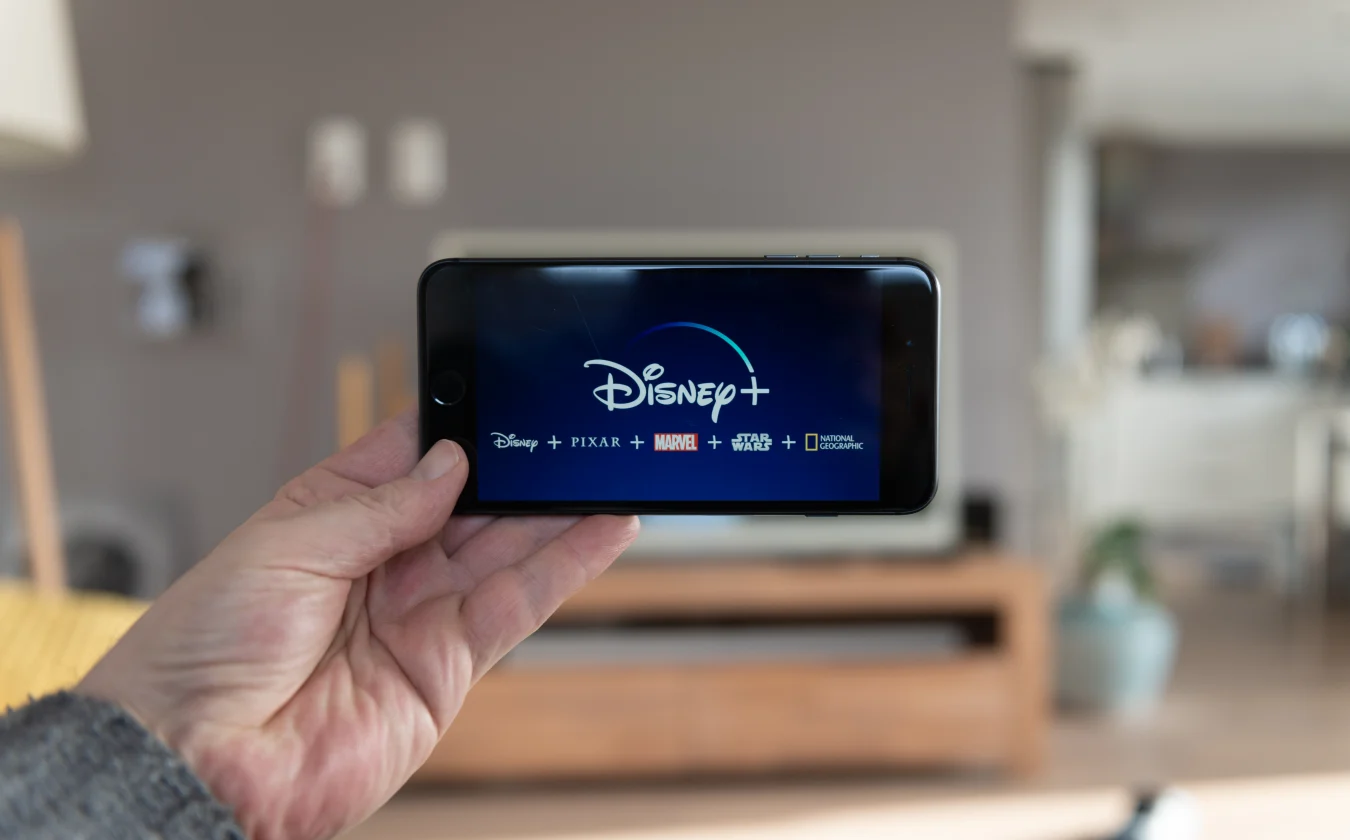 Amsterdam, Netherlands, 02/03/2020, Disney+ home screen on mobile phone.  Disney+ online video, content streaming subscription service.  Disney plus, Star Wars, Marvel, Pixar, National Geographic.