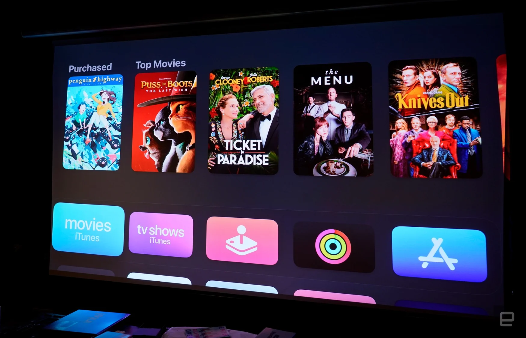 LG CineBeam HU915QE displaying Apple TV 4K home screen