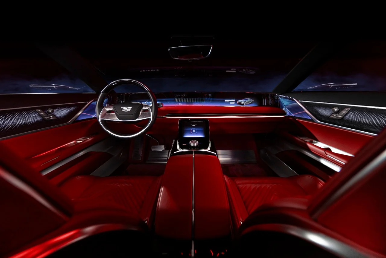 Interior view of the steering wheel, 55-inch pillar-to-pillar advanced LED screen, center console and front seats of the CELESTIQ show car. Show car images displayed throughout (not for sale).