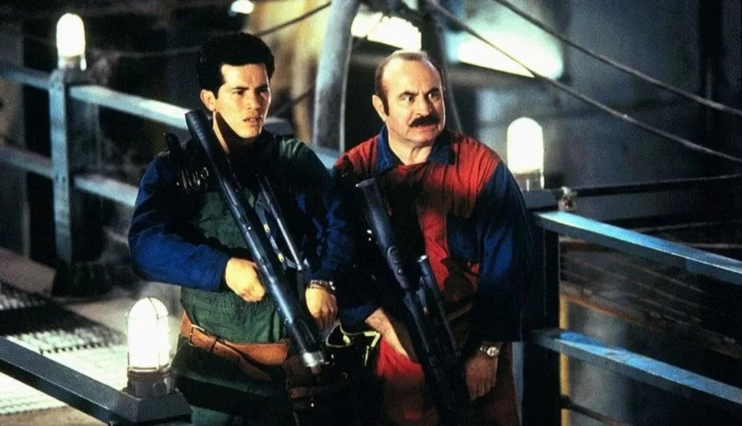 Bob Hoskins and John Leguizamo are shown playing Mario & Luigi in the 1993 movie adaptation of the game.