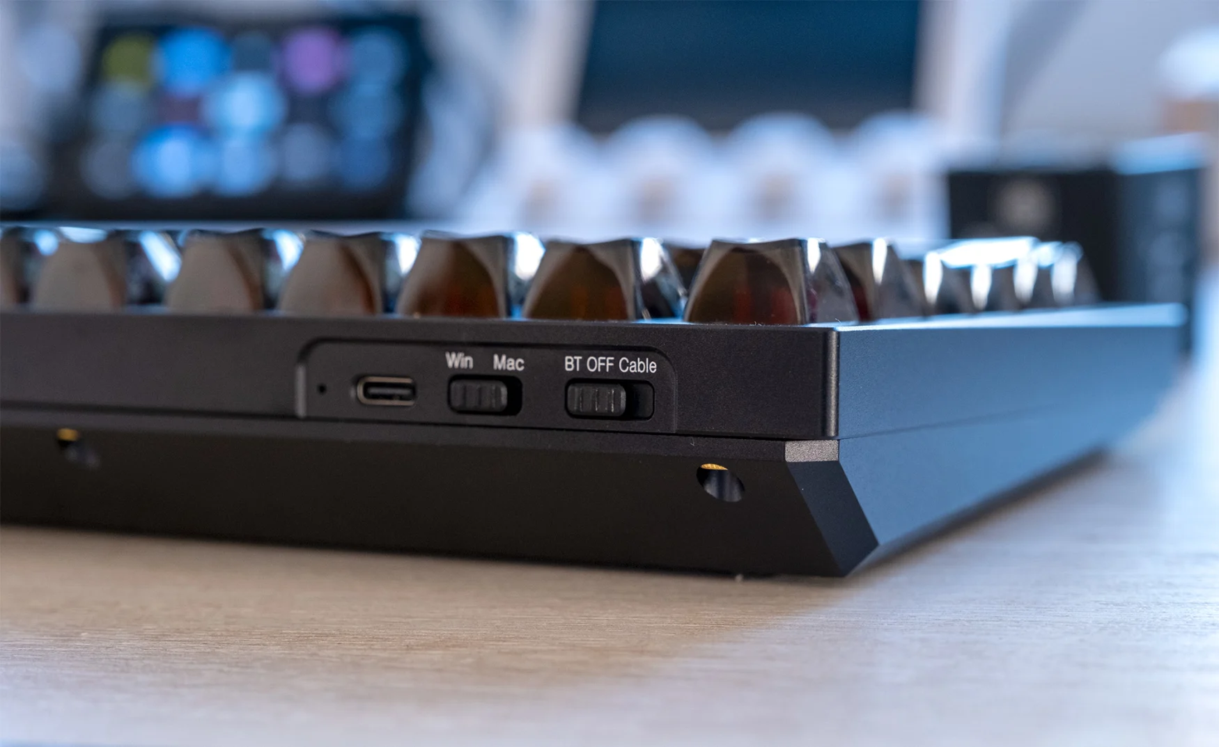 The rearside of the Q1 Pro mechanical keyboard is shown along with the switch to turn on Bluetooth