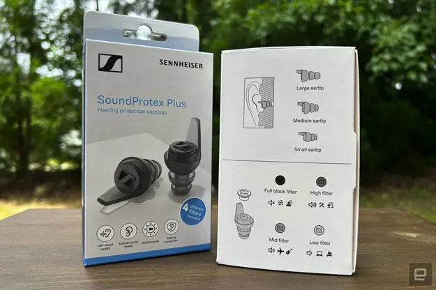 Image of the packaging for Sennheiser's SoundProtex Plus taken on a table in a back yard.