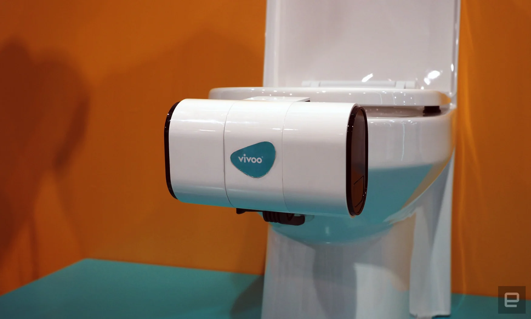 Image of Vivoo's toilet-mounted urine analysis device.