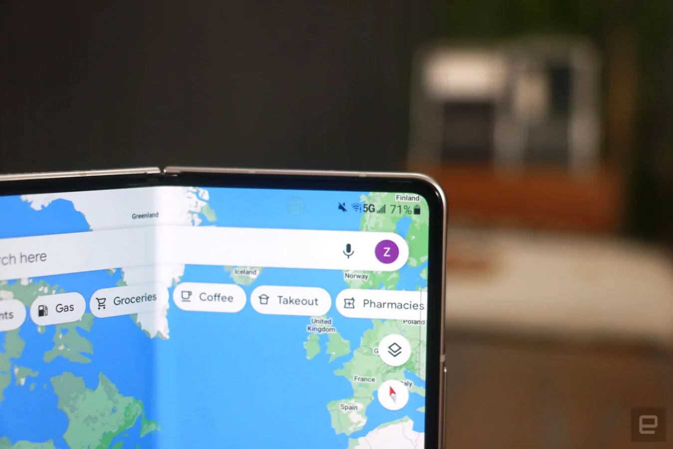 Galaxy Z Fold 3 close up on the under display camera with Google Maps open onscreen.