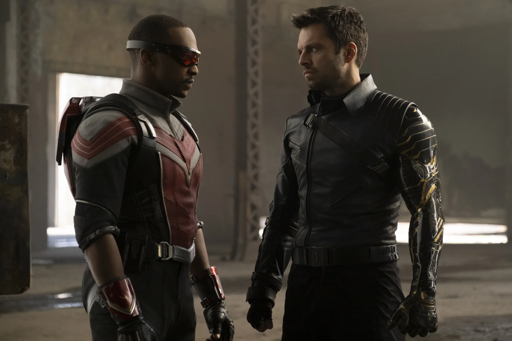 The Falcon (Sam Wilson) and the Winter Soldier (James Barnes) face each other.