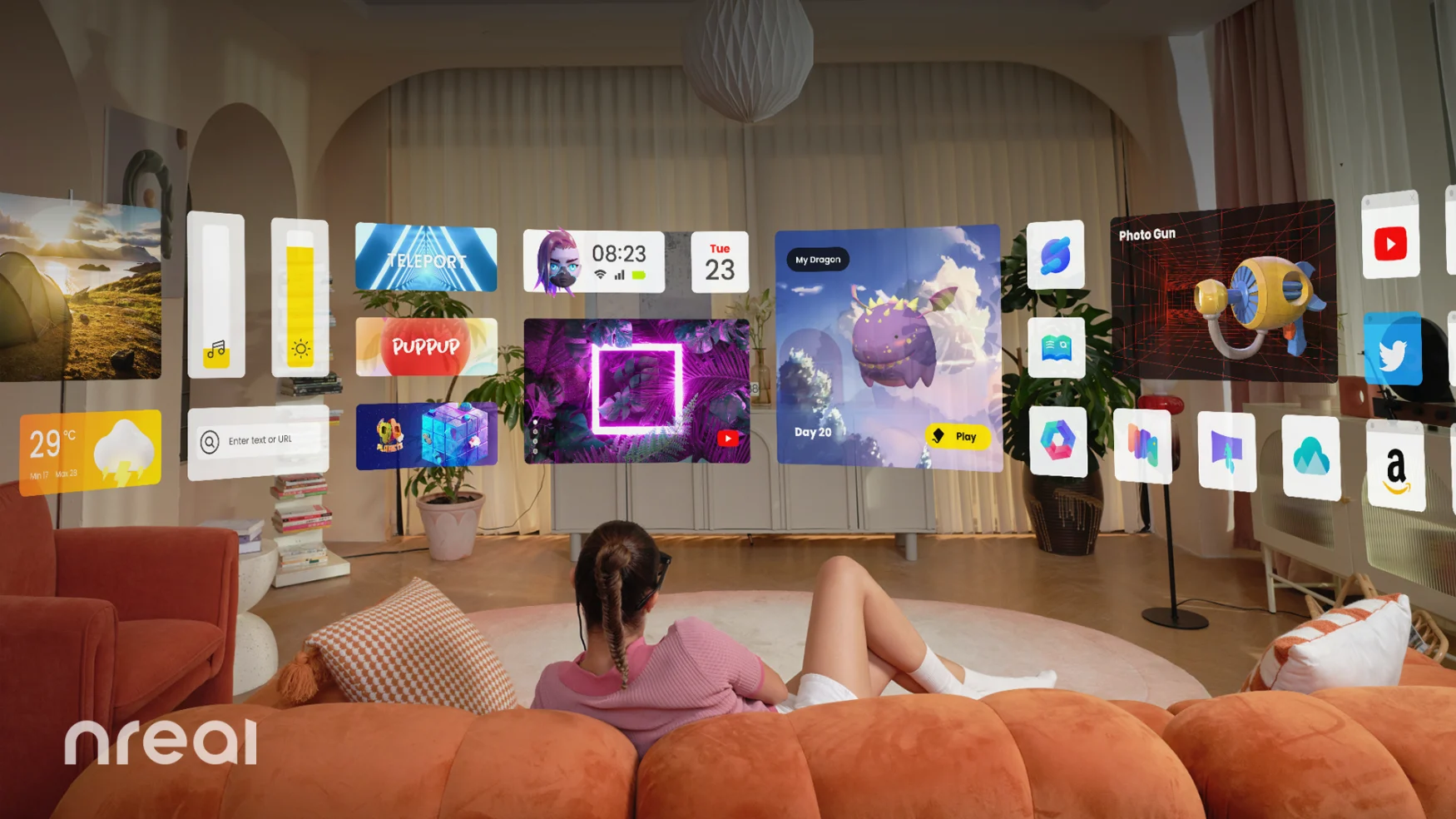 A woman lies down on a couch while looking at a carousel of applications in augmented reality.