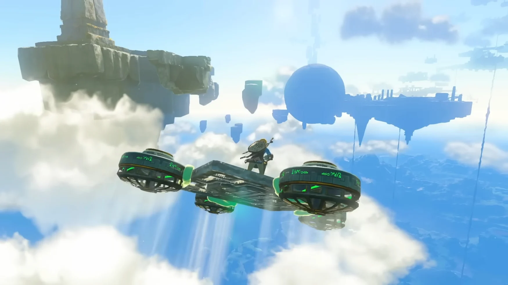 Screenshot from the trailer for “The Legend of Zelda: Tears of the Kingdom.” Link rides in the clouds on a hovercraft as floating islands appear in the distance.
