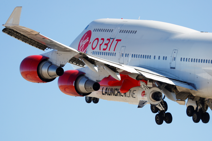 Richard Branson's Virgin Orbit, with a rocket underneath the wing of a modified Boeing 747 jetliner, takes off to for a key drop test of its high-altitude launch system for satellites from Mojave, California, U.S. July 10, 2019.       REUTERS/Mike Blake