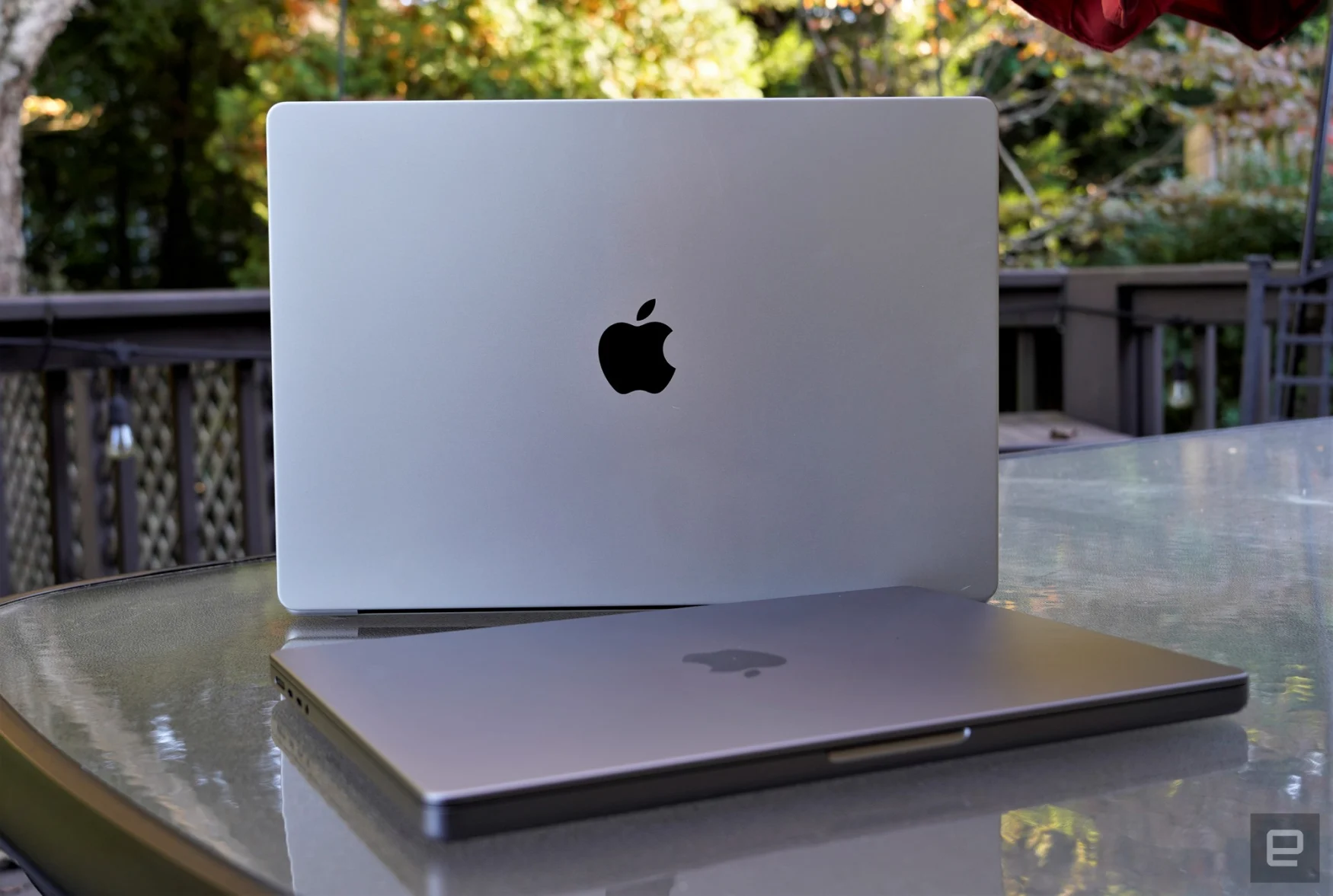 MacBook Pro 14-inch and 16-inch sitting on a table(2021)