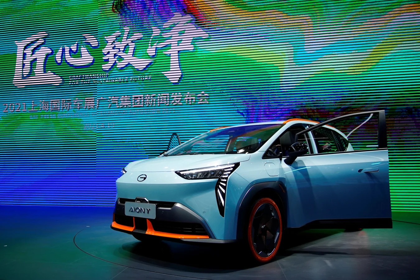 A GAC Aion Y electric vehicle (EV) is seen displayed at the booth of GAC Group during a media day for the Auto Shanghai show in Shanghai, China April 19, 2021. REUTERS/Aly Song