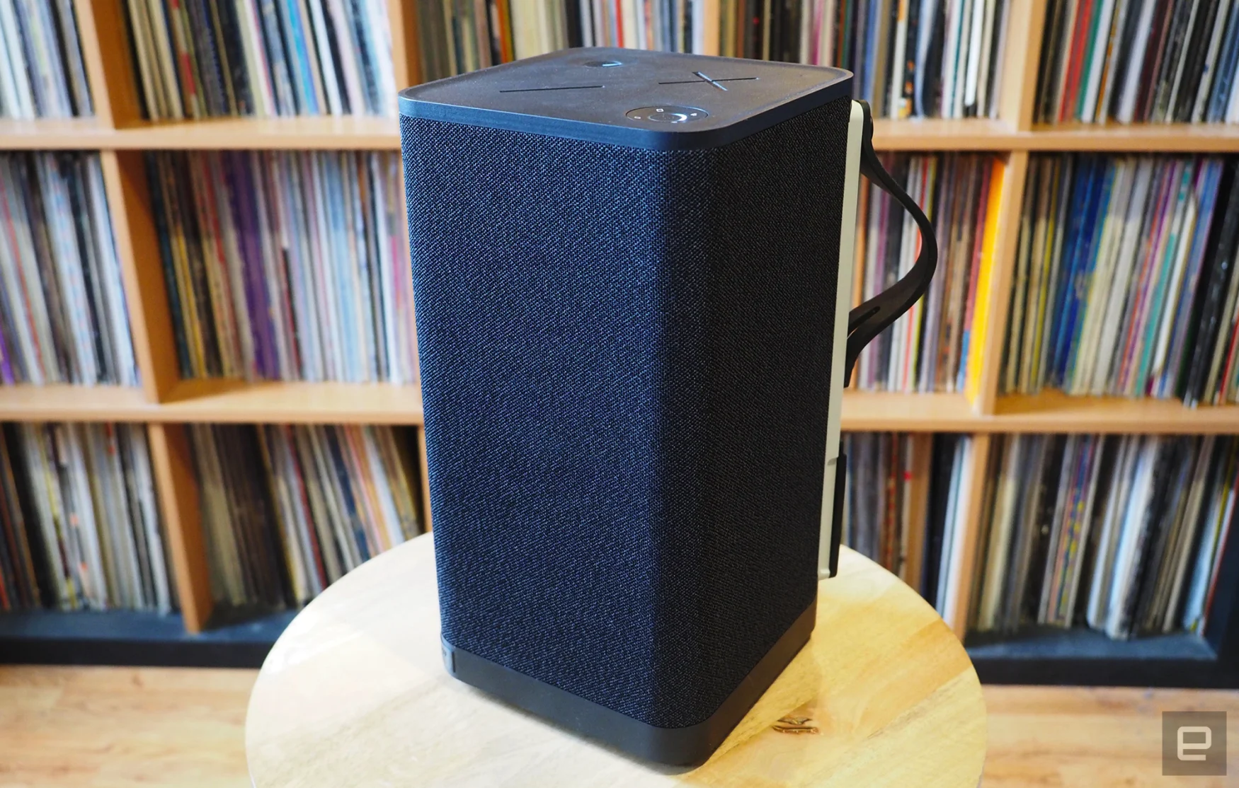 The UE Hyperboom photographed for Engadget's 2022 portable Bluetooth speaker guide in front of a shelf full of records.