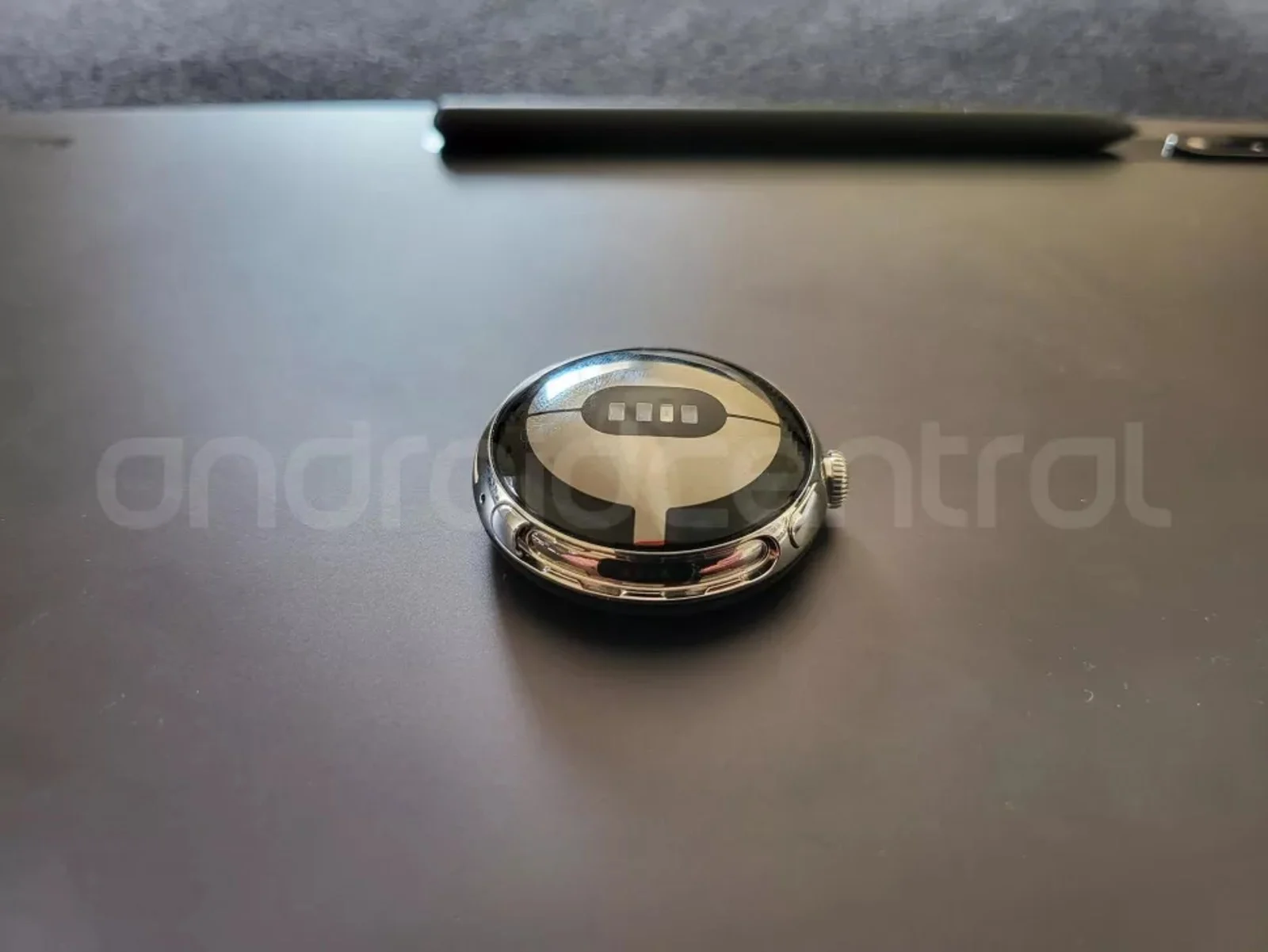 A leaked photo showing the underside of the Pixel Watch, showcasing the wearable's optical heart rate sensor. 
