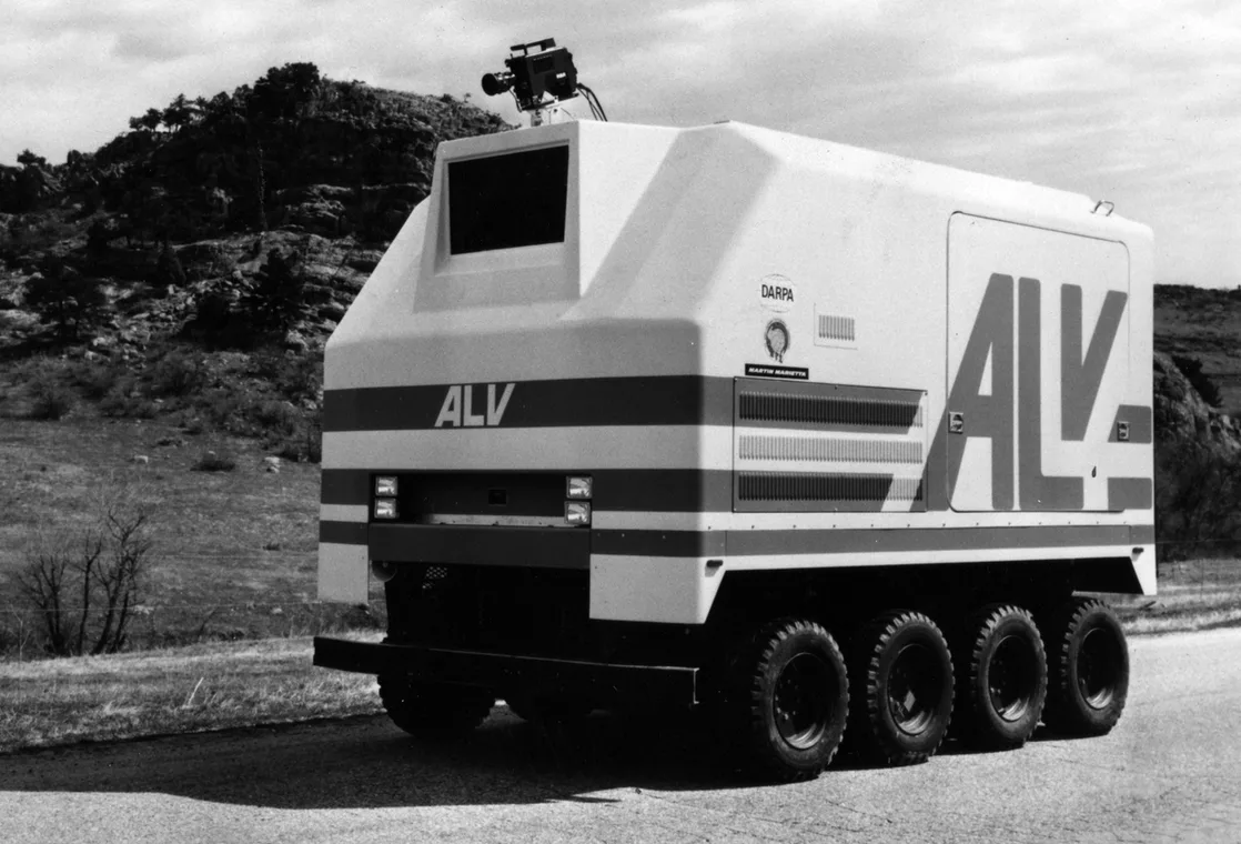 In 1977, a team from Japan's Tsukuba Engineering Research Lab developed one of the first autonomous cars that used cameras to detect white street markers and navigate the roads rather than follow embedded impulses.

In 1983, a DARPA project under the umbrella moniker of Strategic Computing included an autonomous systems study called the Automated Land Vehicle (ALV). It was an early military land 