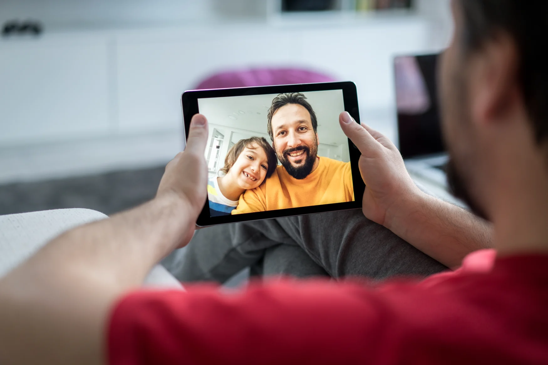 Using tablet for video call with family at home