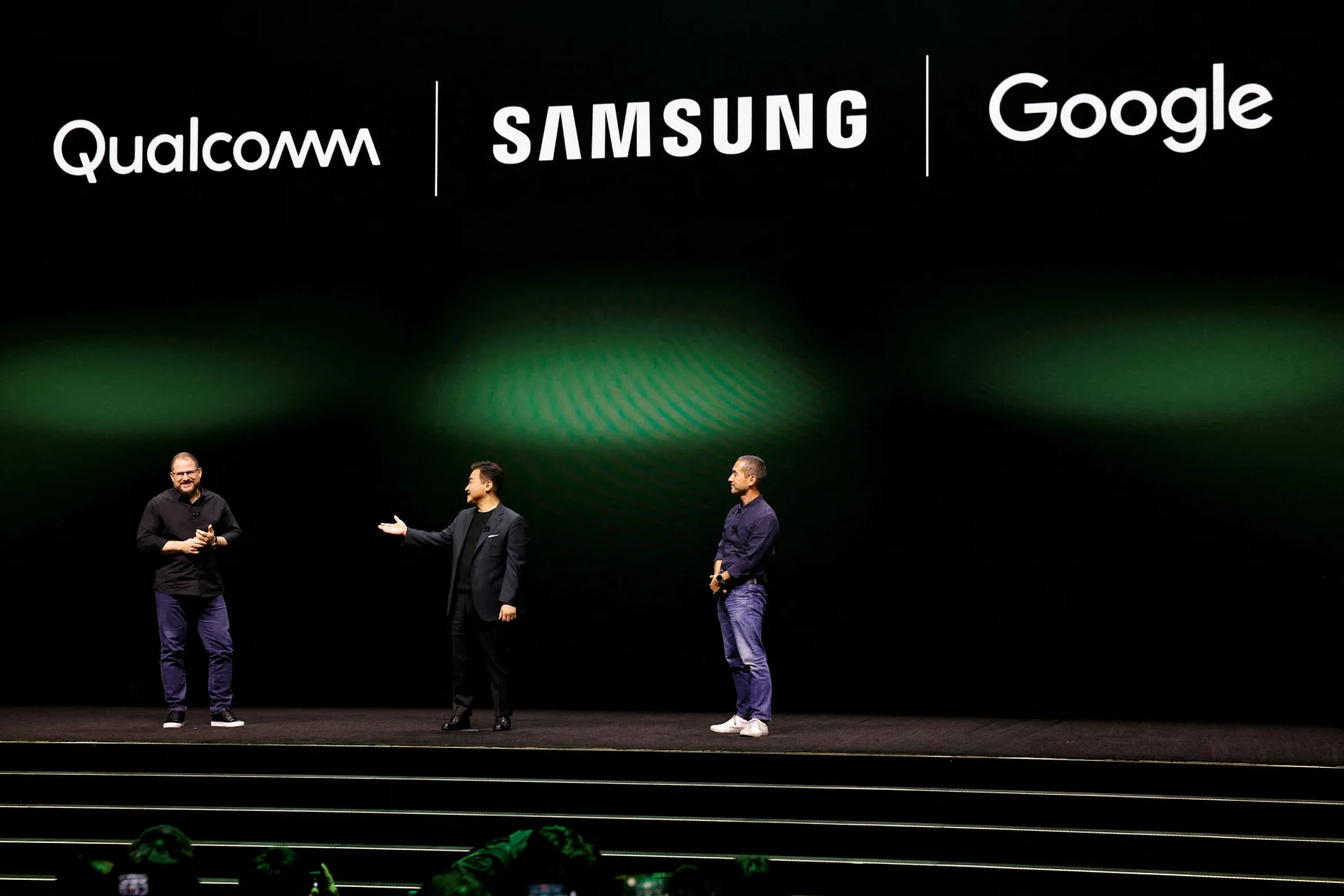 TM Roh, President and Head of Mobile eXperience Business at Samsung Electronics, Cristiano Amon, President & CEO Qualcomm Incorporated, and Hiroshi Lockheimer, SVP, Platforms & Ecosystems at Google, stand on stage as Samsung Electronics unveils its latest flagship smartphones in San Francisco, California, U.S. February 1, 2023. REUTERS/Peter DaSilva REFILE - CORRECTING ID