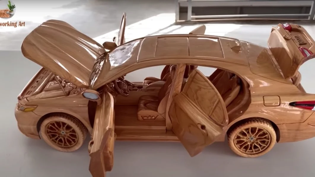 This 2023 Toyota Camry carved out of wood is a work of art