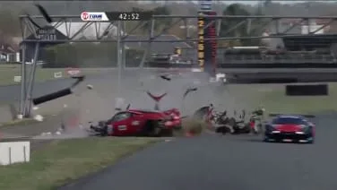 Driver limps away from massive Ferrari crash