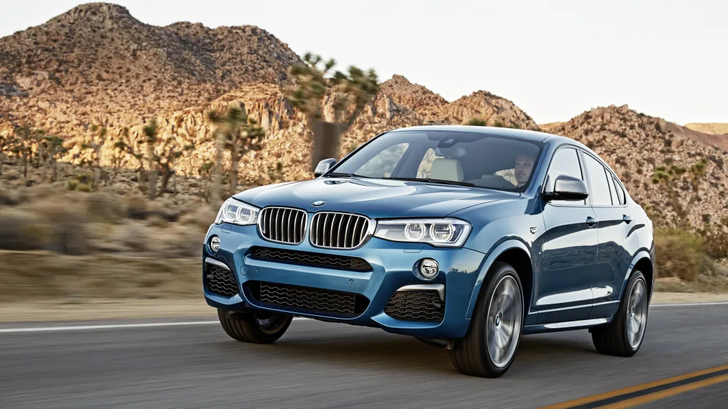 BMW X4 M40i front 3/4 driving road