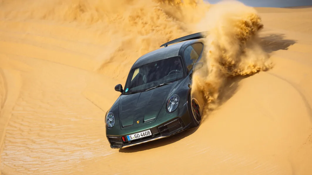 2023 Porsche 911 Dakar in Oak Green downhill action dune