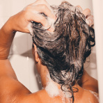 Should you wash your hair more frequently when it's hot out? We asked an expert