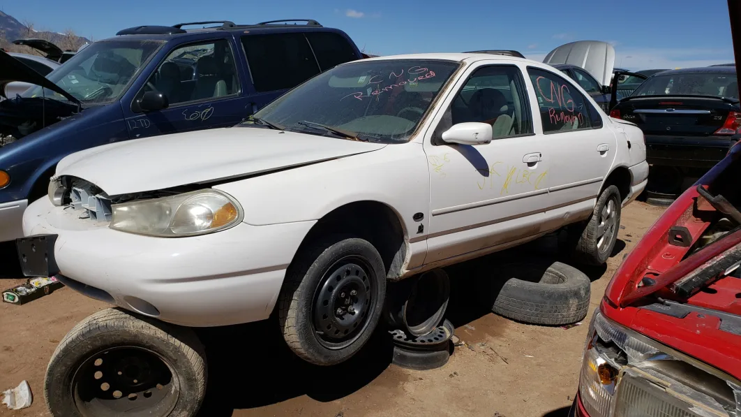 33 -1999 Ford Contour CNG in Colorado Junkyard - photo by Murilee Martin